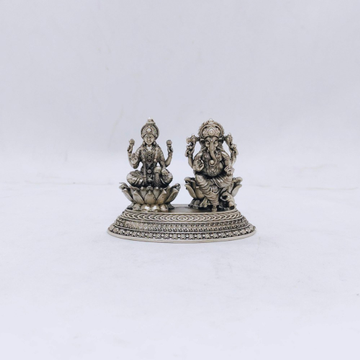 Real silver laxmi ganesh idol in high antique fini...